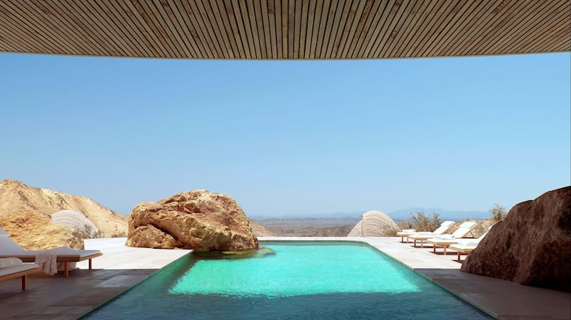 A swimming pool overlooking the valley at Six Senses Southern Dunes. Photo: Foster+Partners