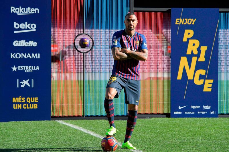 Barcelona's new Ghanaian forward Kevin-Prince Boateng poses during his official presentation. AFP