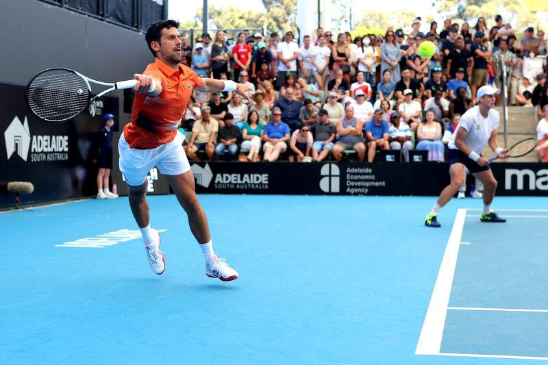 Novak Djokovic plays a return shot. AP Photo