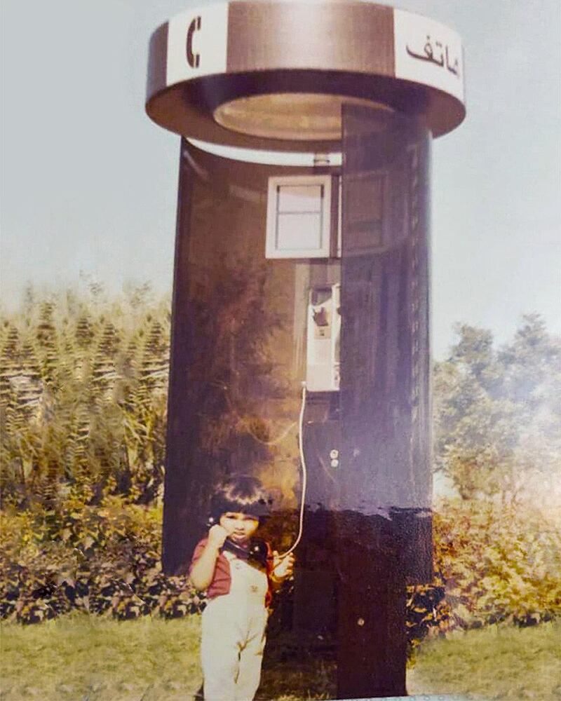 Having lived in the UAE her whole life, Delaine D'Costa used to love wandering the Corniche and play in the old phone booths. Courtesy Etihad