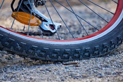 The deeper tread on a gravel bike's tyres gives them better grip on grit and steep terrain. Photo: Markus Distelrath / Pixabay