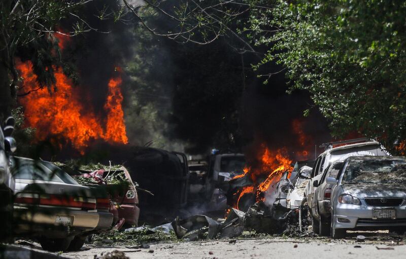 Flames rise after a bomb blast near the office of a Non-Government Organisation and Attorney General's office, in Kabul, Afghanistan. EPA