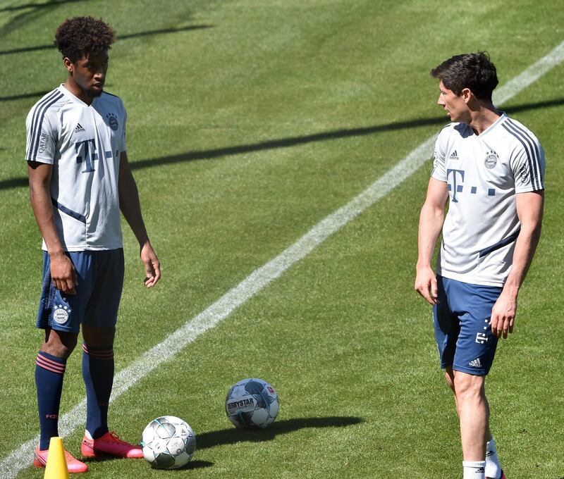 Bayern Munich forwards Robert Lewandowski, right, Kingsley Coman. AFP