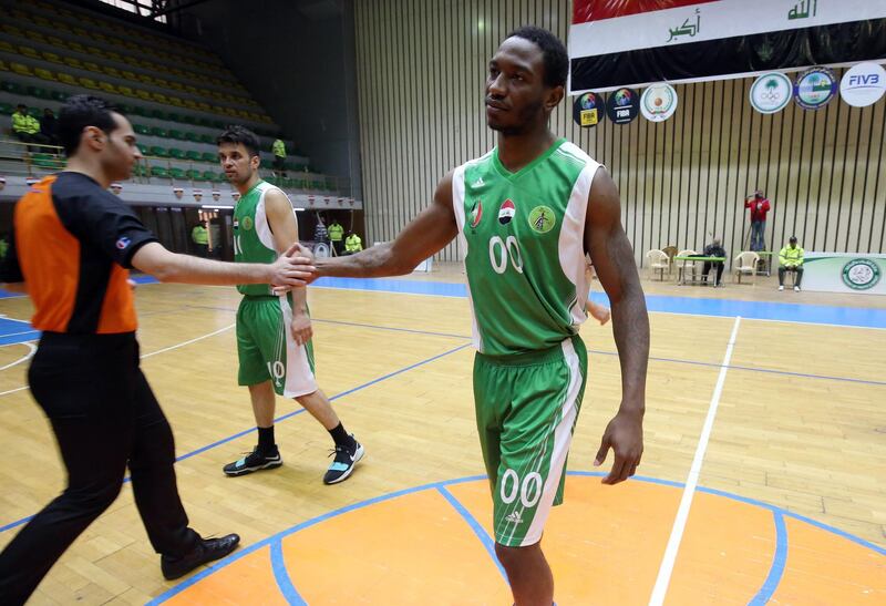 Baghdad's Oil Club guard DeMario Mayfield attends a team training session ahead of their match against Iraq's Airline Club, in Baghdad on December 7, 2017.
DeMario Mayfield feared it was the end of his basketball career when he was arrested for planning a robbery, but the former US college star is bouncing back -- in war-torn Iraq. 

Originally from Georgia in America's deep south, the 6 foot five inch (1.95 metre) player is now leading Iraq's national team after taking citizenship following a 2015 club move to Baghdad. / AFP PHOTO / Ahmad al-Rubaye