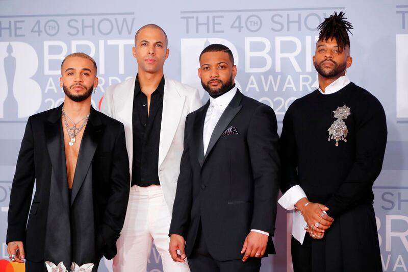 British pop group JLS - Aston Merrygold, Oritse Williams, Marvin Humes, and JB Gill - arrive at the Brit Awards 2020 at The O2 Arena on Tuesday, February 18, 2020 in London, England. AFP