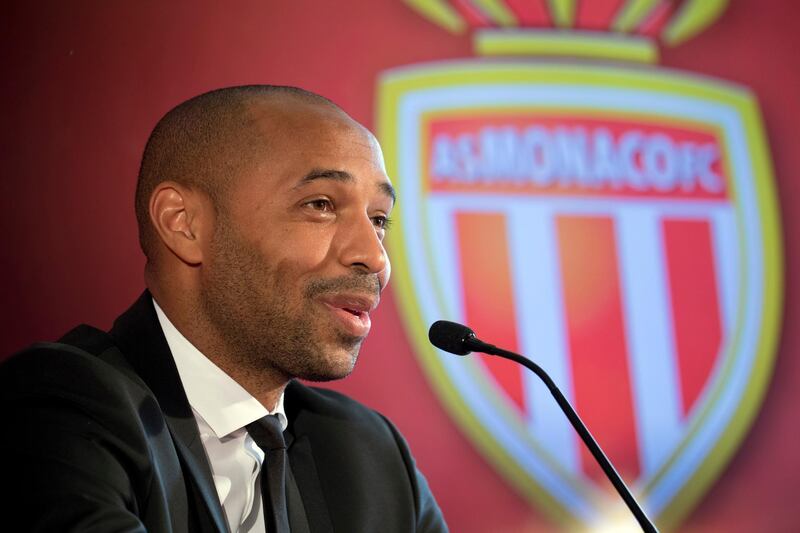 New AS Monaco head coach Thierry Henry answers questions during his official media presentation at the Monaco Yacht Club, Wednesday, Oct. 17, 2018. France's all-time leading scorer and an Arsenal great landed his first managerial job on Saturday after Monaco hired him as a replacement for Leonardo Jardim, who was dismissed this week. (AP Photo/Olivier Anrigo)