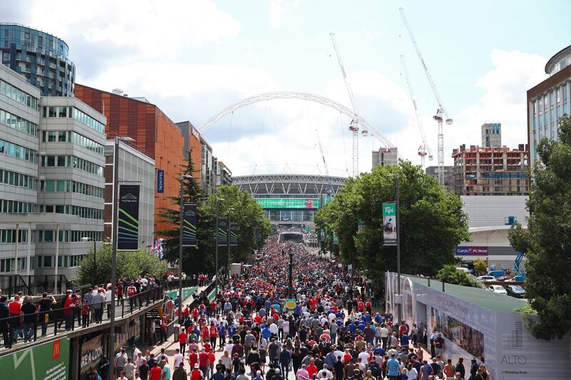 Fans walk up Wembley way towards the stadium prior to the The Community Shield final. Dan Istitene / Getty Images