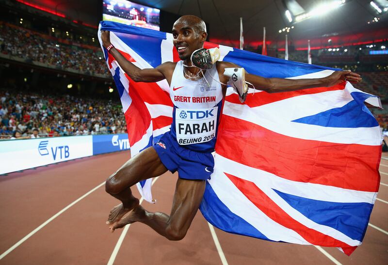 Farah celebrates after crossing the finish line to win gold in the Men's 5,000 metres at IAAF World Athletics Championships in Beijing, China, in 2015. Getty Images