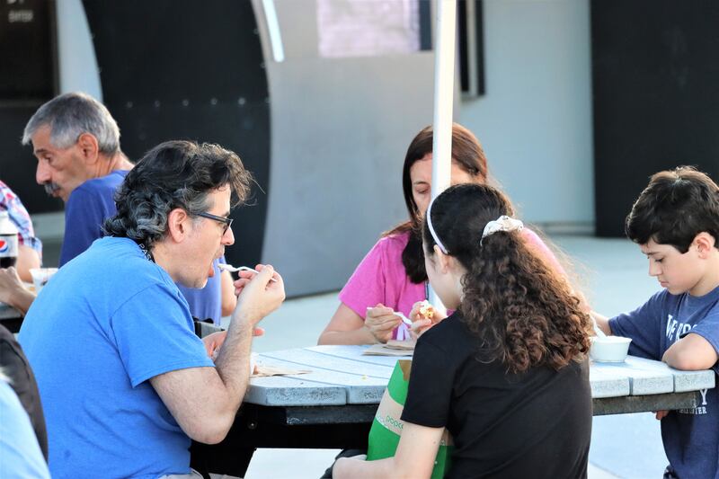 Visitors eat ice cream at the Kennedy Space Centre Visitor Complex.