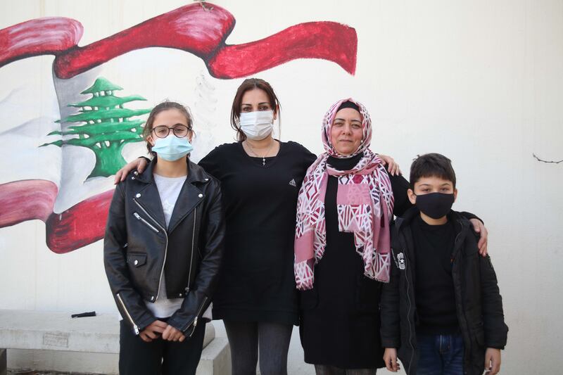 Leen Abu Darwish, 12, Principal Nadine Chabab, English teacher Fatima Kiwan and Mohamed Zoghbi, 9.