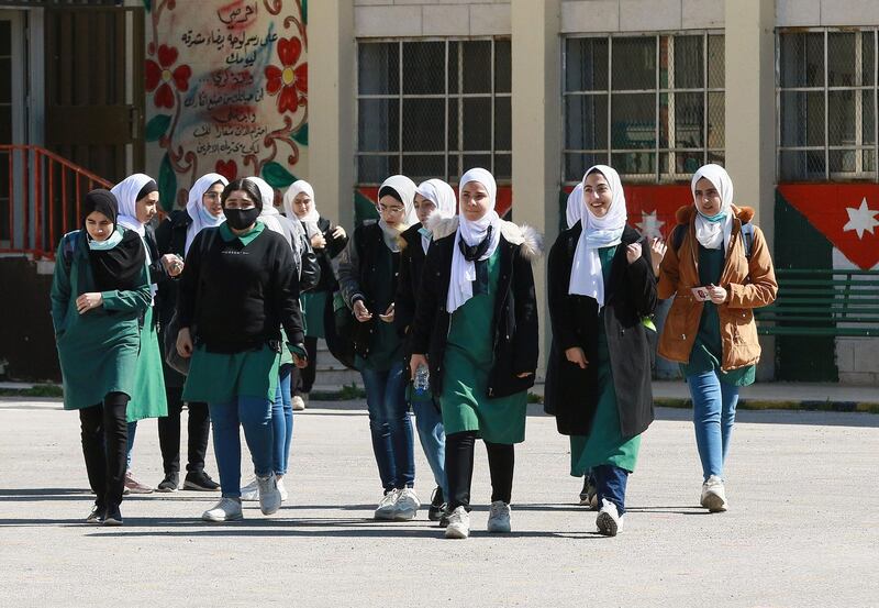 Jordanian pupils return to school for the first time in nearly a year, in the capital Amman. Educational institutions were gradually reopening after a governmental directive to ease Covid-19 restrictions. AFP