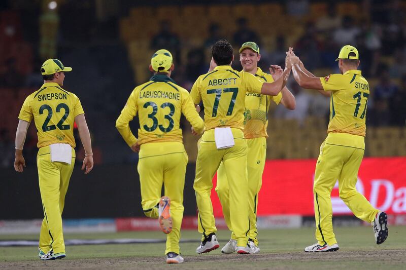Australian players celebrate after taking the wicket of Pakistan's Fakar Zaman. EPA 