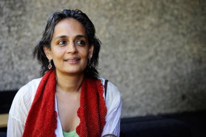 Indian booker prize-winning author and anti-globalisation activist Arundhati Roy poses for photographers on September 8, 2009 ahead of the "International Literature Festival Berlin 2009". The festival takes place from September 9 to September 20, 2009.  AFP PHOTO DDP / AXEL SCHMIDT  GERMANY OUT