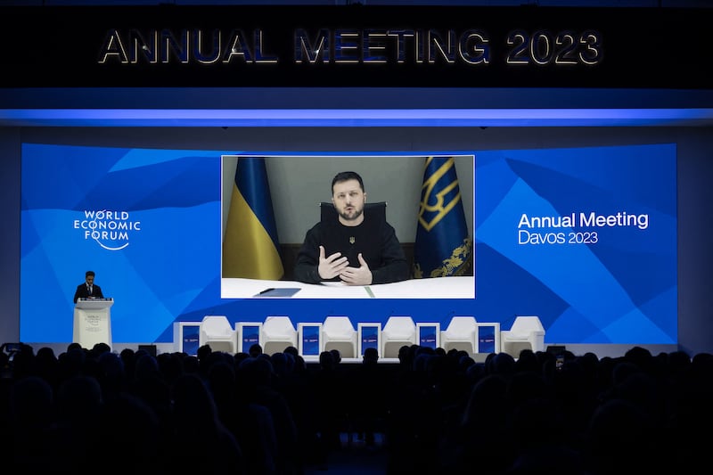 Mr Zelenskyy gives a video address to the forum in Davos. AFP