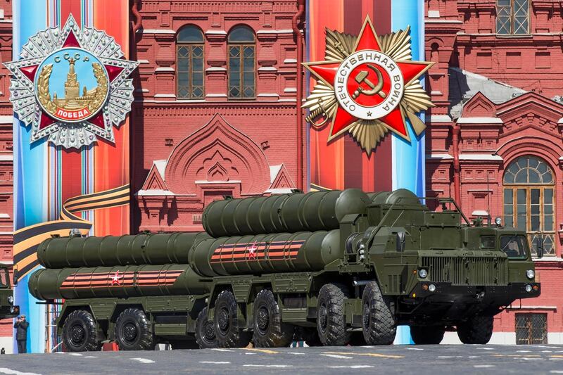 FILE - In this file photo taken on Sunday, May 7, 2017, the S-400 anti-aircraft missile system is driven during a rehearsal for the Victory Day military parade in Red Square in Moscow, Russia. The Russian military is boosting the defense of the occupied Crimean peninsula with more anti-aircraft missiles in the wake of the weekend standoff with Ukrainian vessels in the Black Sea. (AP Photo/Alexander Zemlianichenko, File)