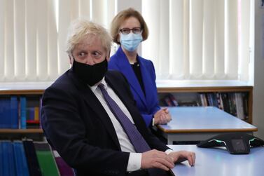 FERRYHILL, ENGLAND - MAY 13: Prime Minister Boris (L) accompanied by Chair of the Global Partnership for Education Julia Gillard visits Cleves Cross Primary school in Ferryhill, northeast England on May 13, 2021 in Ferryhill, England. (Photo by Scott Heppell - WPA Pool/Getty Images)