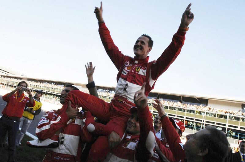 MONZA, ITALY - OCTOBER 29:  German Ferrari driver Michael Schumacher waves to fans during the Ferrari Days on October 29, 2006 in Monza, Italy. Schumacher retired from Formula 1 at the end of the 2006 season after amassing a career 91 Grand Prix wins and 7 World Titles. (Photo by Flavio Mazzi/Bongarts/Getty Images)