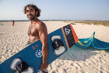 After learning the basics on Youtube, Mohammed Al Mansoori perfected his kitesurfing skills in the waters. Antonie Robertson / The National