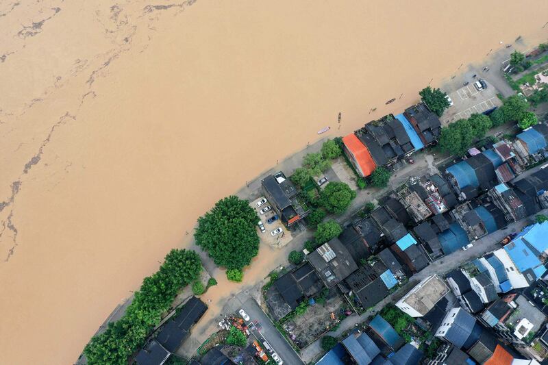 Flooded streets along the swollen Rongjiang river after heavy rains in Rongan, in China's southern Guangxi region.