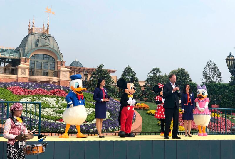 Joe Schott, front right, president and general manager of Shanghai Disneyland, speaks during its reopening ceremony. AP Photo