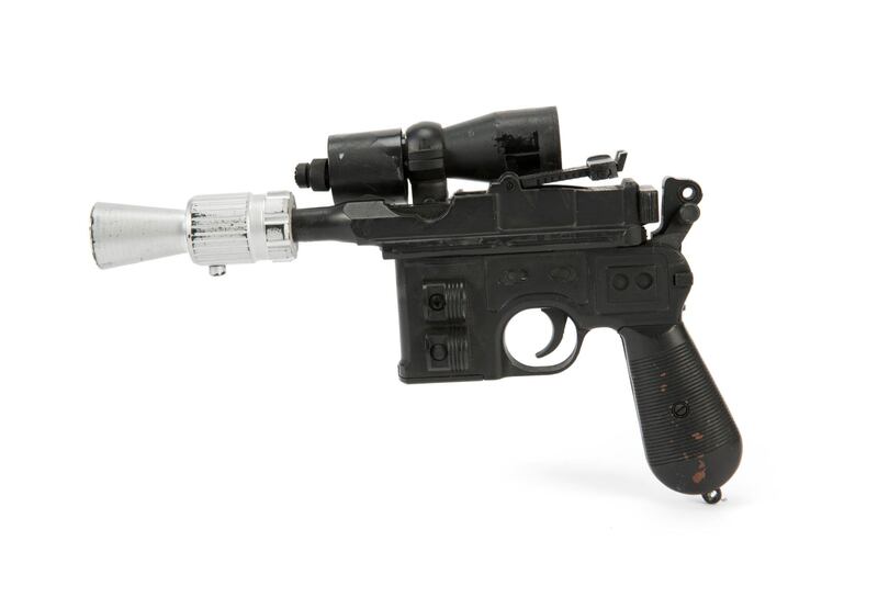 This photo provided by Julien's Auctions shows character Han Solo's BlasTech DL-44 blaster from the Star Wars trilogy film "Return of the Jedi" (Lucasfilm, 1983) that sold for $550,000 at Julien's Auctions Hollywood Legends auction at Planet Hollywood Resort & Casino, in Las Vegas, on Saturday, June 23, 2018.  Julienâ€™s Auctions say Ripleyâ€™s Believe It Or Not purchased the sci-fi weapon. (Julien's Auctions via AP)