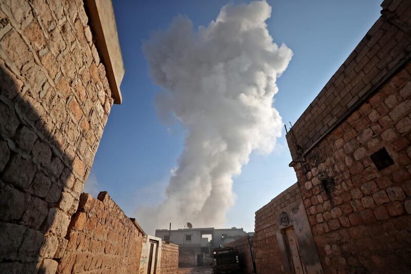 A smoke plume billowing into the air after a reported Russian air strike in the village of Tal Mardikh in Syria's northwestern Idlib province. AFP
