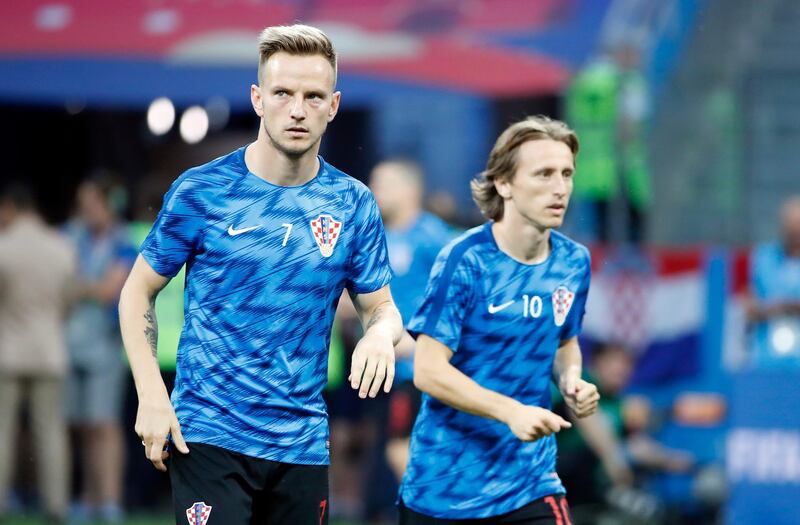 epa06855978 Ivan Rakitic of Croatia (L) and Luka Modric of Croatia warm up prior the FIFA World Cup 2018 round of 16 soccer match between Croatia and Denmark in Nizhny Novgorod, Russia, 01 July 2018.

(RESTRICTIONS APPLY: Editorial Use Only, not used in association with any commercial entity - Images must not be used in any form of alert service or push service of any kind including via mobile alert services, downloads to mobile devices or MMS messaging - Images must appear as still images and must not emulate match action video footage - No alteration is made to, and no text or image is superimposed over, any published image which: (a) intentionally obscures or removes a sponsor identification image; or (b) adds or overlays the commercial identification of any third party which is not officially associated with the FIFA World Cup)  EPA/FRANCK ROBICHON   EDITORIAL USE ONLY
