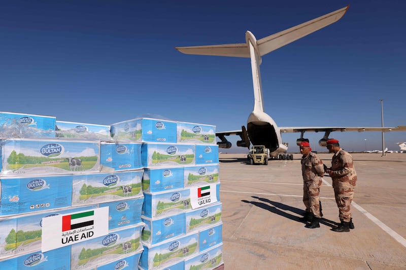 Soldiers at Benina Airport in Libya supervise the arrival of aid from the UAE for survivors of the floods in Derna. AFP