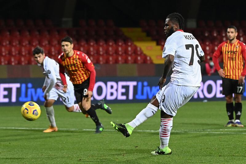 AC Milan's Franck Kessiescores from the spot. AFP