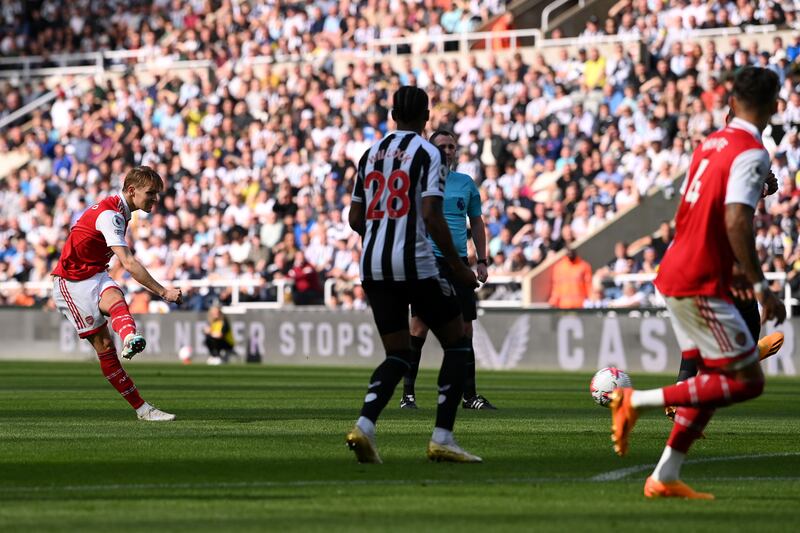 Martin Odegaard of Arsenal scores his side's first goal against Newcastle United in the Premier League match at St James' Park on May 7, 2023. Getty 