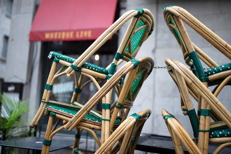 Chairs stacked outside a bistro as the Quebec government has ordered all restaurants, bars and casinos to close for 28 days effective midnight September 30 as Covid-19 numbers continue to rise in Montreal, Quebec, Canada, 29 September. Christinne Muschi / Reuters