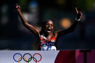 Hokkaido , Japan - 7 August 2021; Peres Jepchirchir of Kenya crosses the finish line to win the women's marathon at Sapporo Odori Park on day 15 during the 2020 Tokyo Summer Olympic Games in Sapporo, Japan.  (Photo By Ramsey Cardy / Sportsfile via Getty Images)