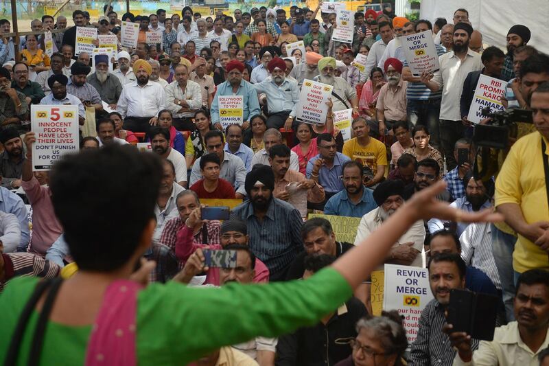 Customers and depositors of the Punjab and Maharashtra Co-operative (PMC) Bank attend a protest demanding to get their money back after an alleged 43.55 billion rupees (614 million USD) scam, in Mumbai on October 30, 2019.   / AFP / Punit PARANJPE
