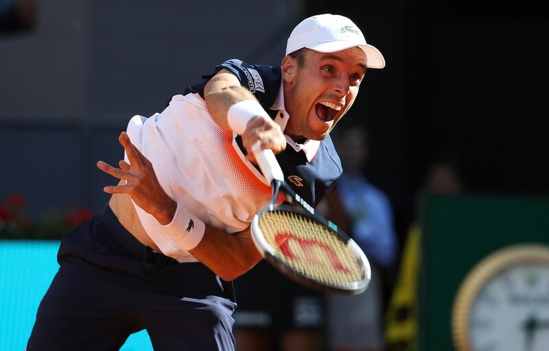 MADRID, SPAIN - MAY 7: Roberto Bautista Agut of Spain in action during day 4 of the Mutua Madrid Open at La Caja Magica on May 7, 2019 in Madrid, Spain. (Photo by Jean Catuffe/Getty Images)