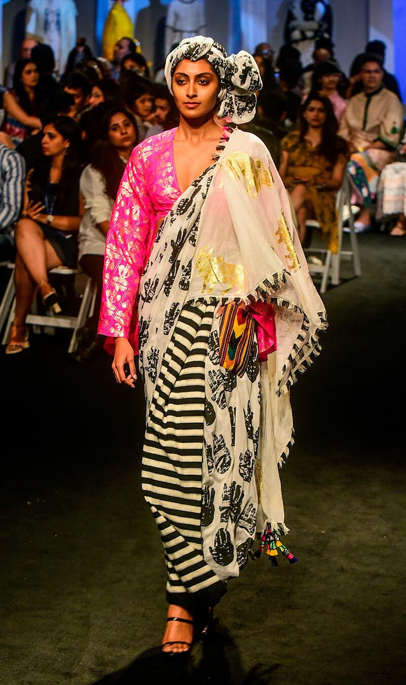 A model presents a creation by Masaba during Lakme Fashion Week summer/resort 2020 in Mumbai, India, on February 12, 2020. AFP