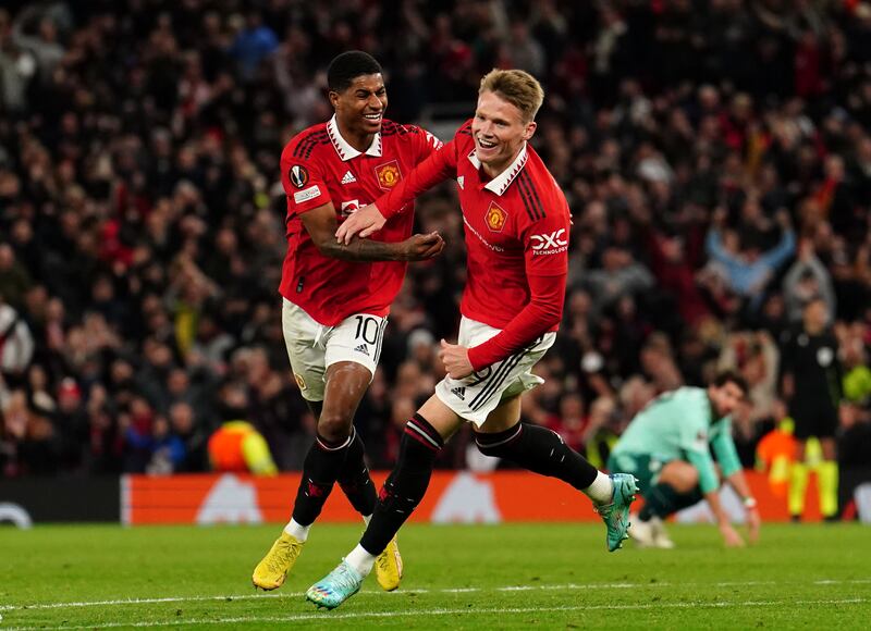 McTominay celebrates with Marcus Rashford. PA