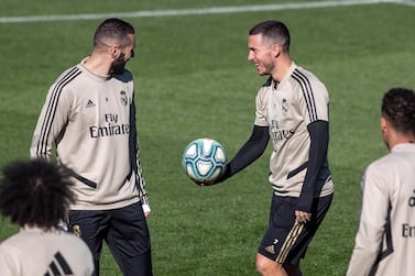 Real Madrid's Karim Benzema, left, and Eden Hazard during training at Valdebebas sport city. EPA 