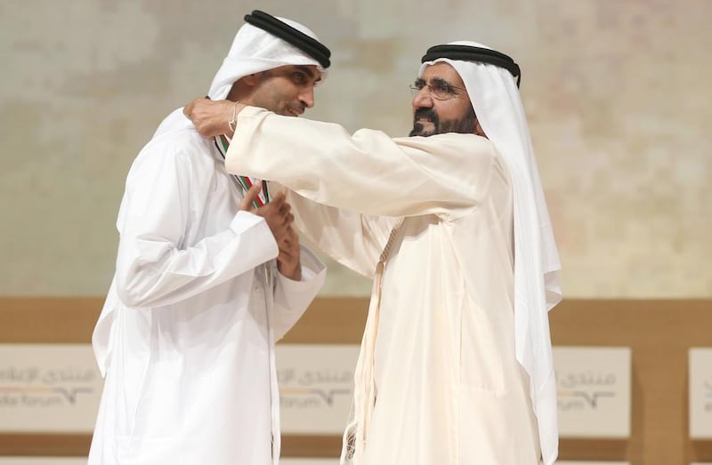Sheikh Mohammed bin Rashid, Vice President and Ruler of Dubai, recognises H E Mohamed Ebraheem Al Mahmood, Abu Dhabi Media Chairman and Managing Director, at the Emirati Media Forum for the company’s coverage of the military campaign in Yemen. Wam