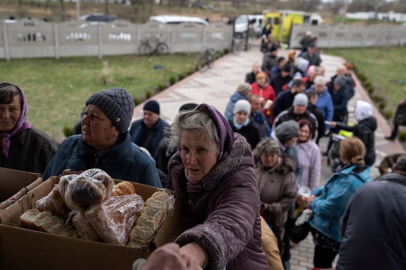 Food distribution at a church in the town of Borodyanka, north-west of Kyiv. AP