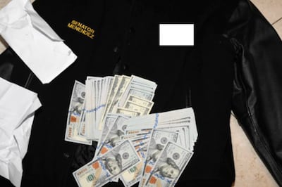 A jacket bearing Bob Menendez's name that was purportedly found with cash in envelopes when federal agents investigated an alleged bribery scheme. AP
