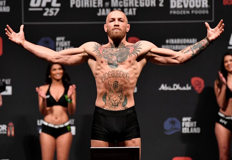 ABU DHABI, UNITED ARAB EMIRATES - JANUARY 22: Conor McGregor of Ireland poses on the scale during the UFC 257 weigh-in at Etihad Arena on UFC Fight Island on January 22, 2021 in Abu Dhabi, United Arab Emirates. (Photo by Jeff Bottari/Zuffa LLC) *** Local Caption *** ABU DHABI, UNITED ARAB EMIRATES - JANUARY 22: Conor McGregor of Ireland poses on the scale during the UFC 257 weigh-in at Etihad Arena on UFC Fight Island on January 22, 2021 in Abu Dhabi, United Arab Emirates. (Photo by Jeff Bottari/Zuffa LLC)