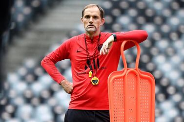 Paris Saint-Germain's German head coach Thomas Tuchel watches his players take part a training session at the Shenzhen Universiade Stadium in Shenzhen on August 2, 2019, on the eve of the French Trophy of Champions football match between Rennes and Paris Saint-Germain. / AFP / FRANCK FIFE