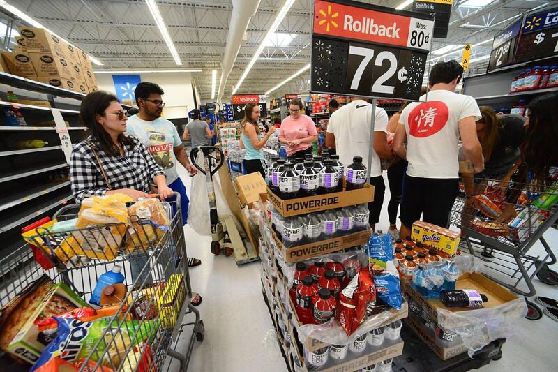 Residents shop at a Wal-Mart Super Store. AFP