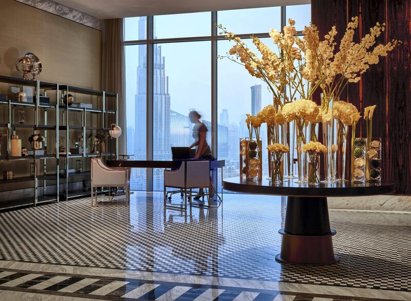 The design embraces a sleek 1960s aesthetic, with marble, ebony, brass and bronze accents. Courtesy Waldorf Astoria