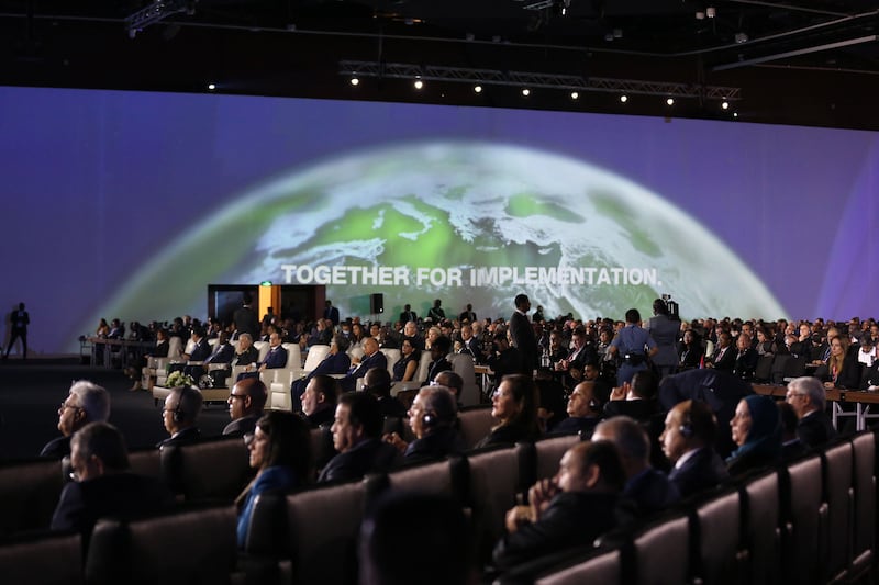 Delegates attend a session at Cop27. Bloomberg