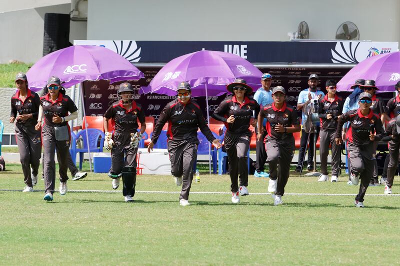 Chaya Mughal leads the UAE team out at the Sylhet Cricket Stadium. 