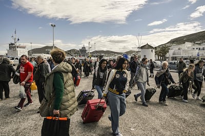 Tourists throng the main port on the Greek island of Paros. 'Sustainable travel' has been a regular part of the travel industry's lexicon for a few years now. AFP