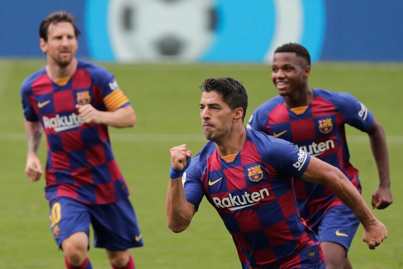 Barcelona's Luis Suarez celebrates his second goal. AP