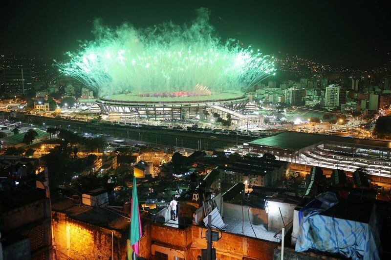 Fireworks explode over Maracana stadium with the Mangueira ‘favela’ community in the foreground during opening ceremonies for the Rio 2016 Olympic Games in Rio de Janeiro, Brazil. The Rio 2016 Olympic Games commenced tonight at the iconic stadium. Mario Tama / Getty Images