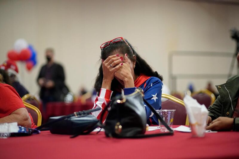 President Donald Trump supporter Loretta Oakes reacts while watching returns in favor of Democratic presidential candidate former Vice President Joe Biden, at a Republican election-night watch party, in Las Vegas. AP Photo